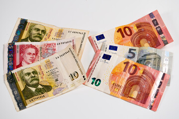 European and International Currency Displayed on a Neutral Background