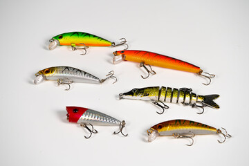Colorful Fishing Lures Displayed on a White Background for Anglers