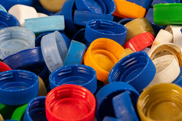 Colorful Plastic Bottle Caps Piled Together in a Recycling Initiative