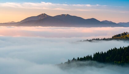 Fototapeta premium Misty mountain sunrise view