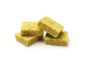 Many aromatic bouillon cubes isolated on white
