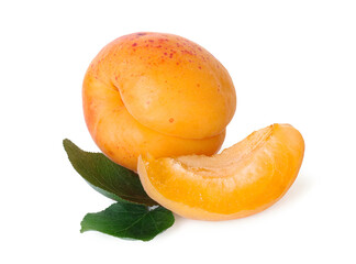 Fresh ripe apricots and green leaves isolated on white