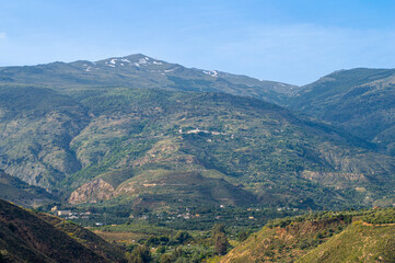 Fototapeta premium Hiking trail to Mulhacen peak in the spring in Sierra Nevada National Park, Spain
