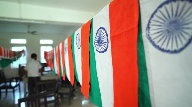Indian national flag hangs to dry in a manufacturing unit
