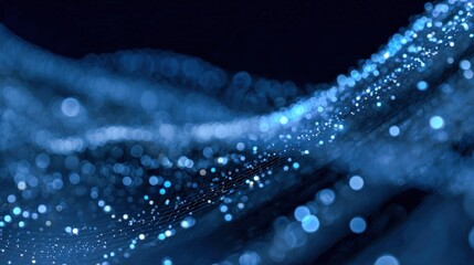 Abstract Blue Particle Wave Background with Depth of Field for Technology and Science Concepts