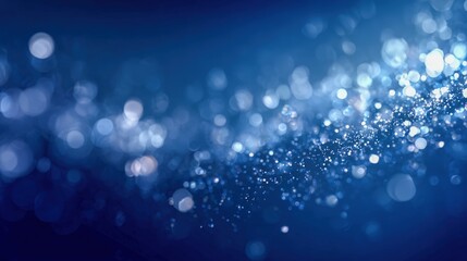 Elegant Blue Bokeh Lights Background with Sparkling Effects, Perfect for Technology and Festive Designs