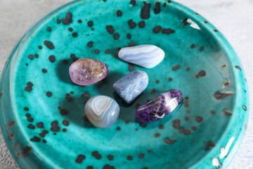 Aura. Different natural mineral stones on table, closeup
