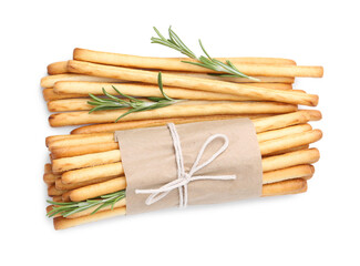 Delicious grissini sticks with rosemary isolated on white, top view