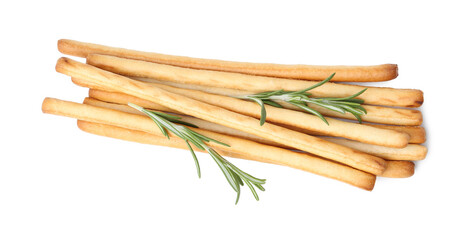 Delicious grissini sticks with rosemary isolated on white, top view