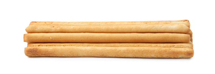Many delicious grissini sticks isolated on white