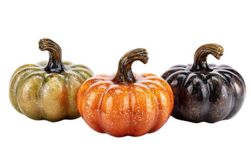 Three decorative pumpkins in orange green and black colors isolated on a transparent background autumn