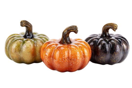 Three decorative pumpkins in orange green and black colors isolated on a transparent background autumn