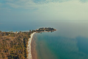 Aerial view of serene coastal landscape.