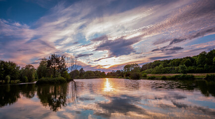Sunset on a pond in Santeny, france