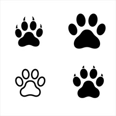 Fototapeta premium Paw Print Collection A Variety of Animal Tracks for Design and Illustration Featuring Bears Dogs and Other Creatures in Black and White
