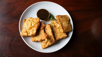fried tempeh and petis chili sauce dish
