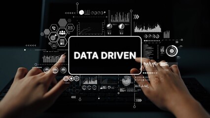 Hands Typing on Laptop with Data Driven Text and Graphic Analytics Overlay for Technology and Business Concept. Asymptotic smart data analytic.