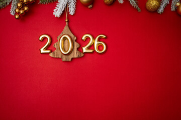 Christmas and Happy New year 2026 with gold glitter decorations on red bright background. Holiday...