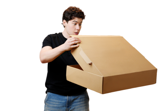 young man open a cardboard box