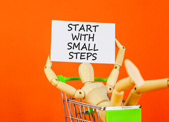 Start with small steps symbol. Concept words phrase Start with small steps on beautiful card....