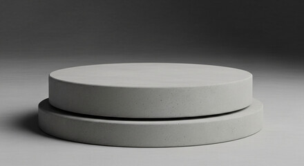 Minimalistic gray podiums on a dark background, showcasing a modern design aesthetic for display