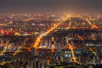 Overlooking Beijing cityscape at night from Western Hills