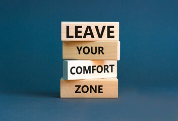 Leave your comfort zone symbol. Concept words Leave your comfort zone on beautiful wooden blocks....