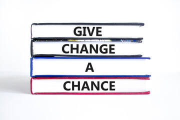 Give change a chance symbol. Concept words phrase Give change a chance on beautiful books. Beautiful white paper background. Business Give change a chance concept. Copy space.