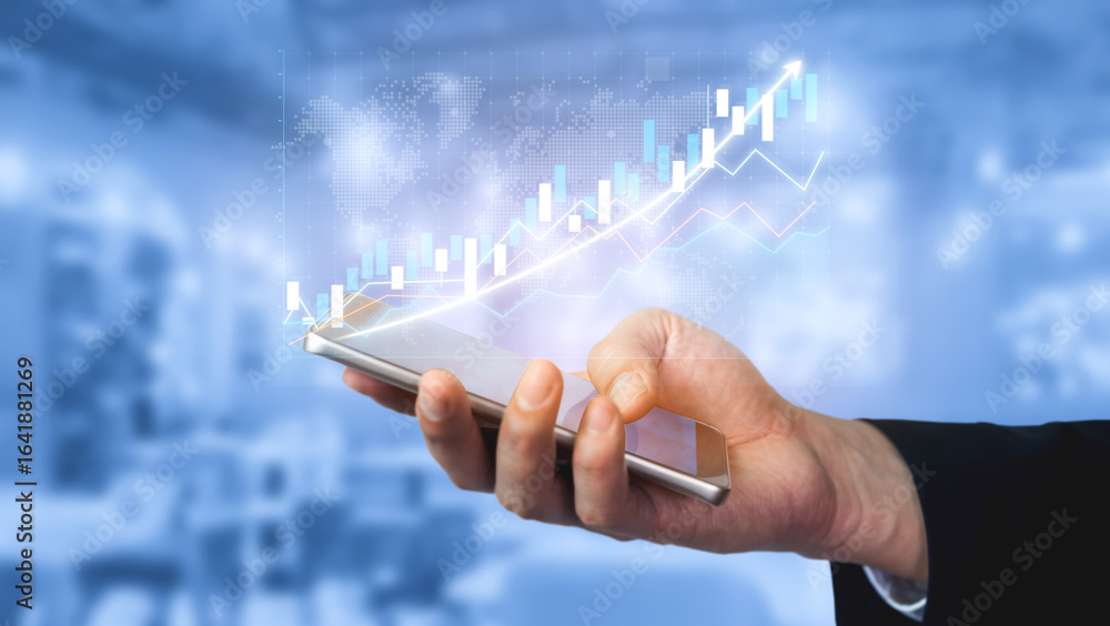 Poster a hand holds a smartphone displaying financial data and a growth graph. the modern office background