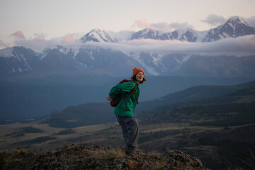 Fototapeta premium Travel and tourism. Girl in the mountains. Natural landscape