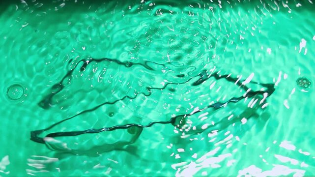 Ultrasonic cleaner with eyeglasses in water, high-frequency waves removing dirt from lenses, precision optical cleaning, hygiene and vision care in modern professional setup.