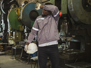 Industrial engineer technician foreman worker man one person with uniform safety vest look and...