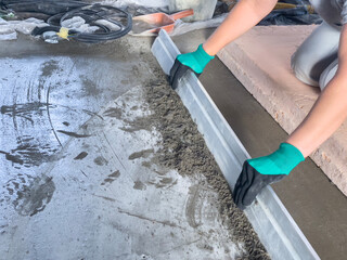 Grinding and leveling of cement floor surface