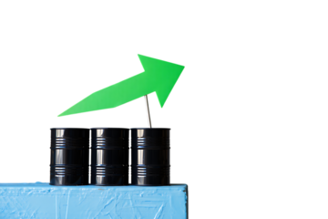 Green Upward Trending Arrow Sign Rising Above Three Black Oil Barrels on a Textured Blue Surface
