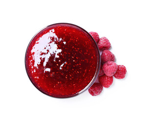 Sweet raspberry jam in glass bowl and berries isolated on white, top view