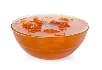 Tasty apricot jam in glass bowl isolated on white