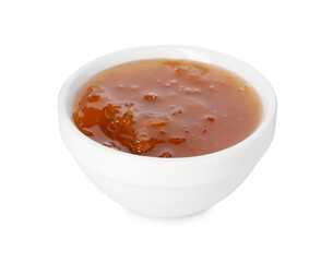 Tasty apricot jam in bowl isolated on white