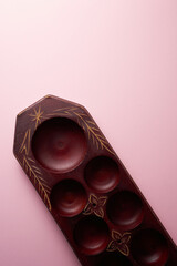 congkak or congklak, Traditional game with lots of holes and using seeds