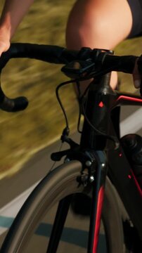 Close up of road bicycle handlebar with gps navigator. Vertical video