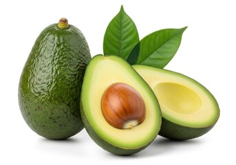 Three ripe avocados one whole and one halved with green leaves fruit food