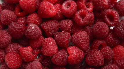 Fresh ripe raspberries pattern background 