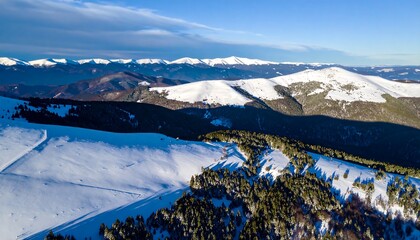 Snowy mountain range aerial view