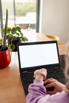 Laptop screen displaying white screen website