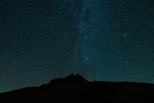 Starry sky above the mountain in Alps 