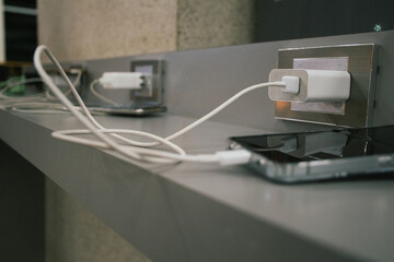 Multiple phones connected to charging station 