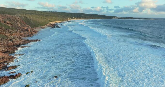 4k Aerial views of rugged rocky coastline in South West Australia at sunset
