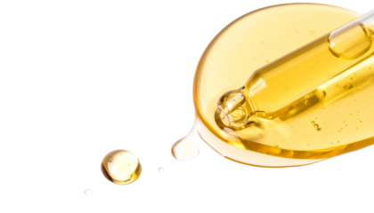 Golden serum droplet from dropper on sleek black background