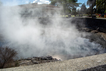 Geothermal Hot Spring with Steam and Scenic Surroundings