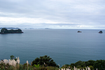 Serene Coastal Landscape with Distant Islands