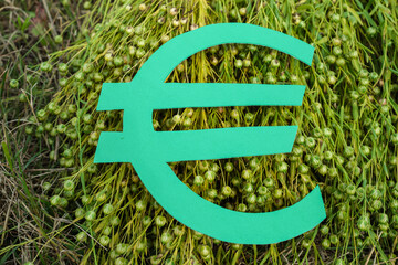 Green Euro Sign. European Flax Linen. Sustainable resource.